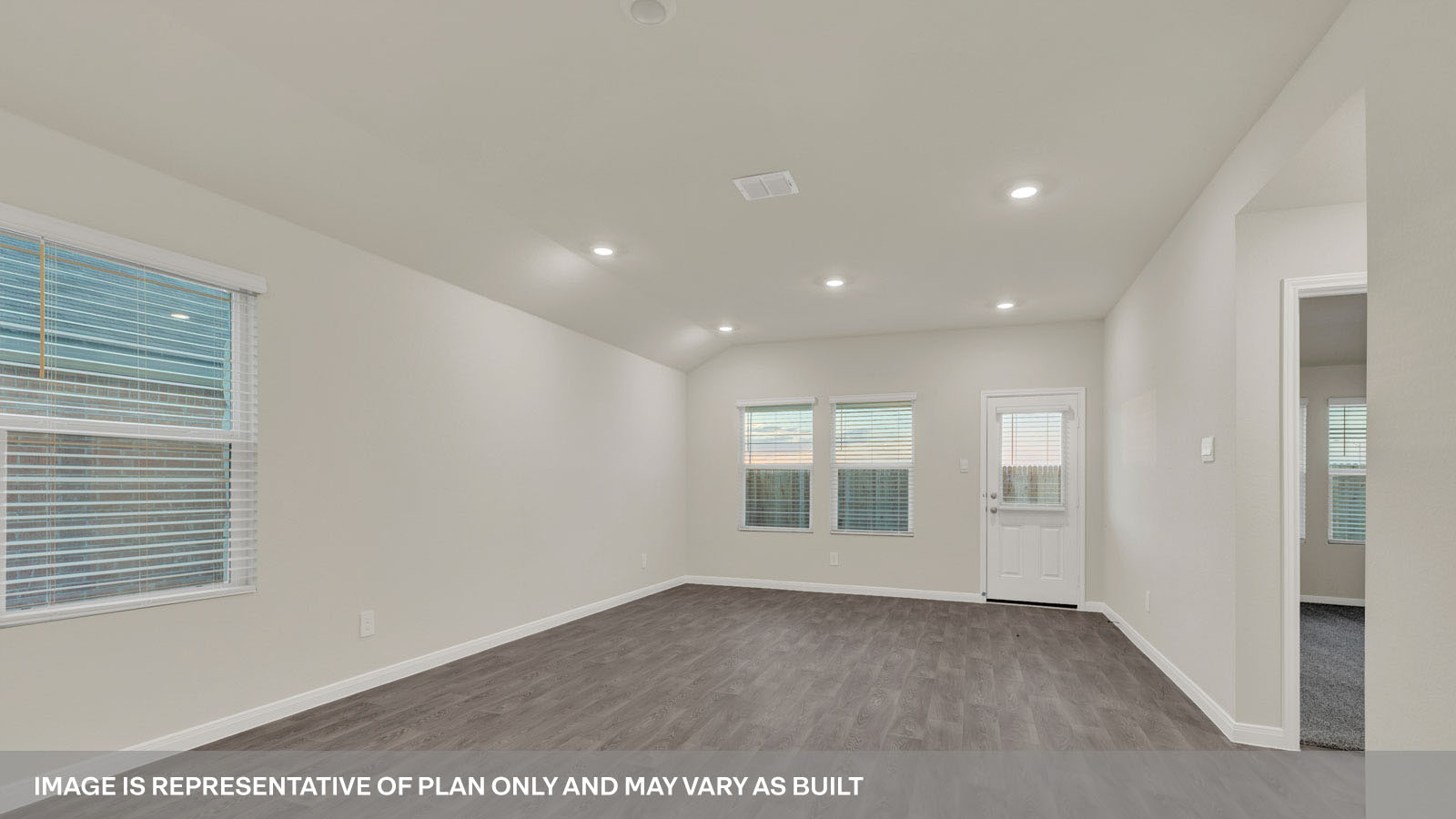 Open concept first floor with the living room, dining room and kitchen next to each other