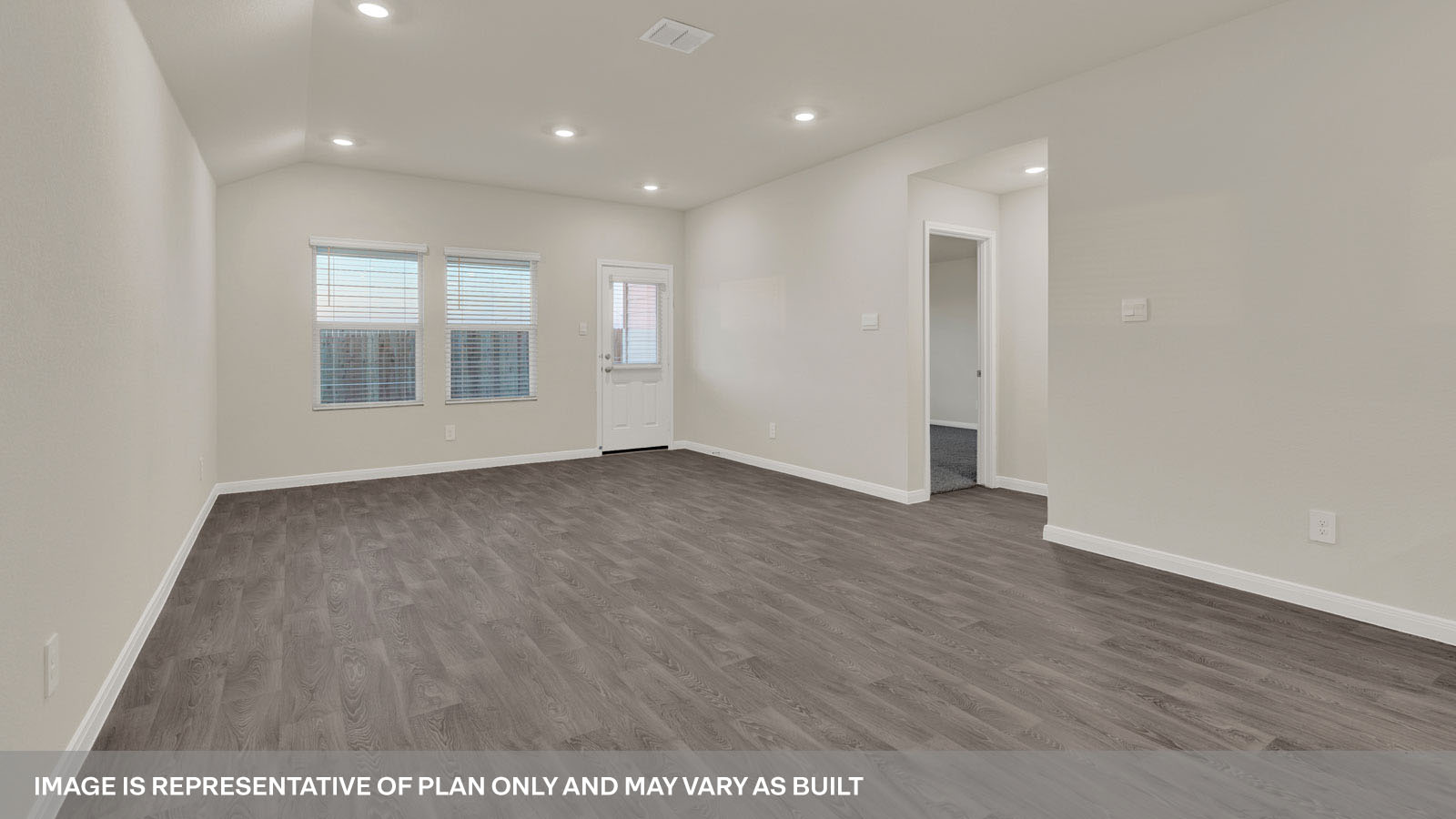 Open concept first floor with the living room, dining room and kitchen next to each other