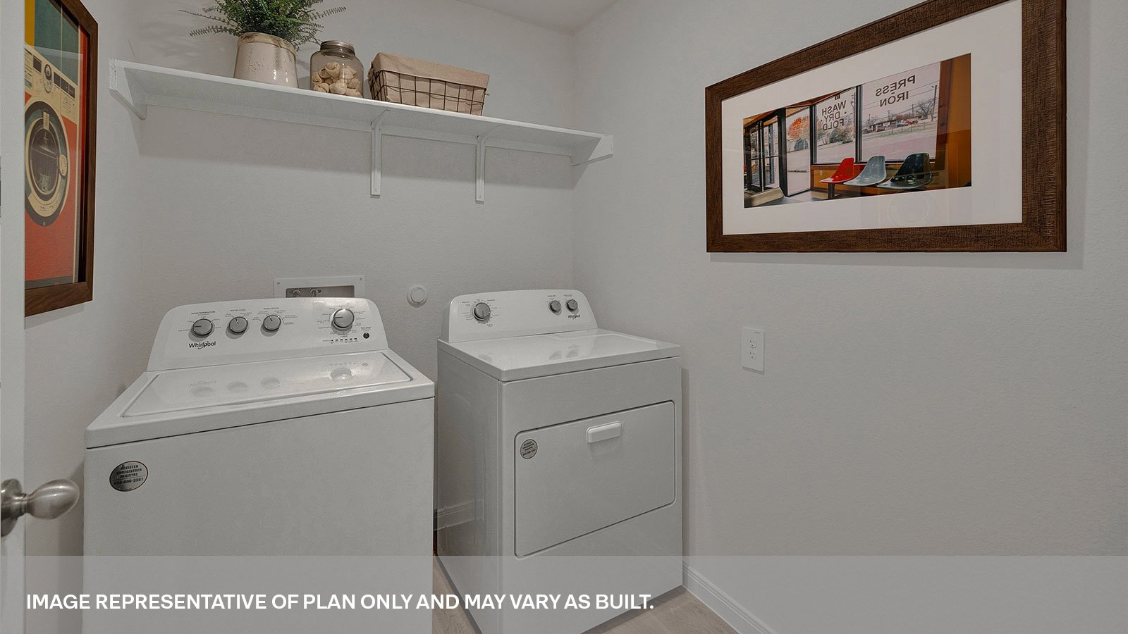 Laundry room with washer/dryer connections and wooden shelving.