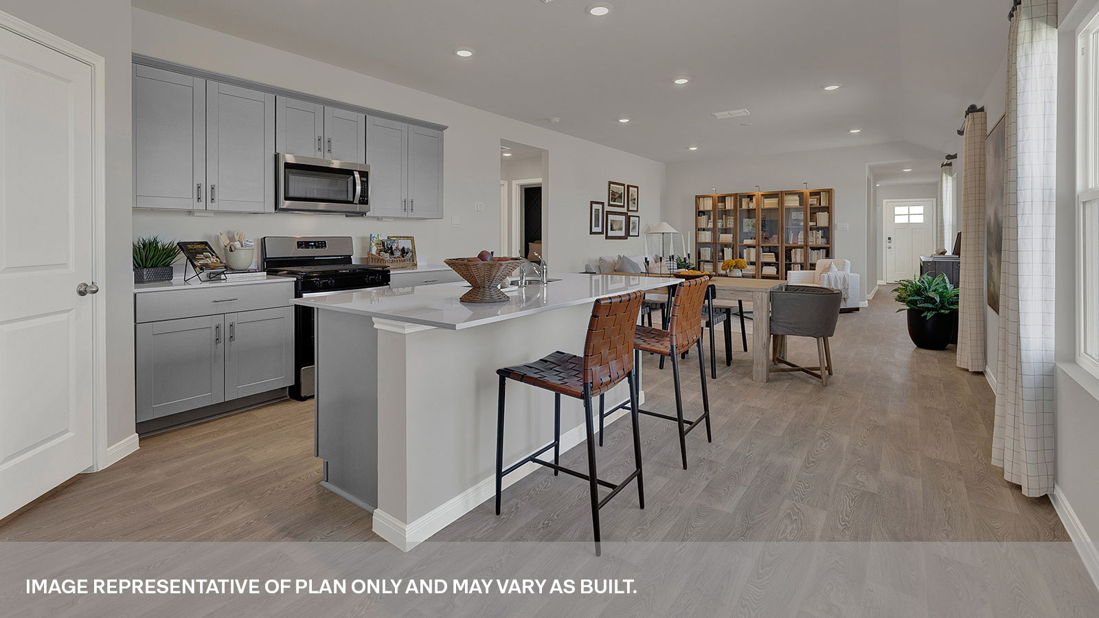 Kitchen with kitchen island and kitchen sink.