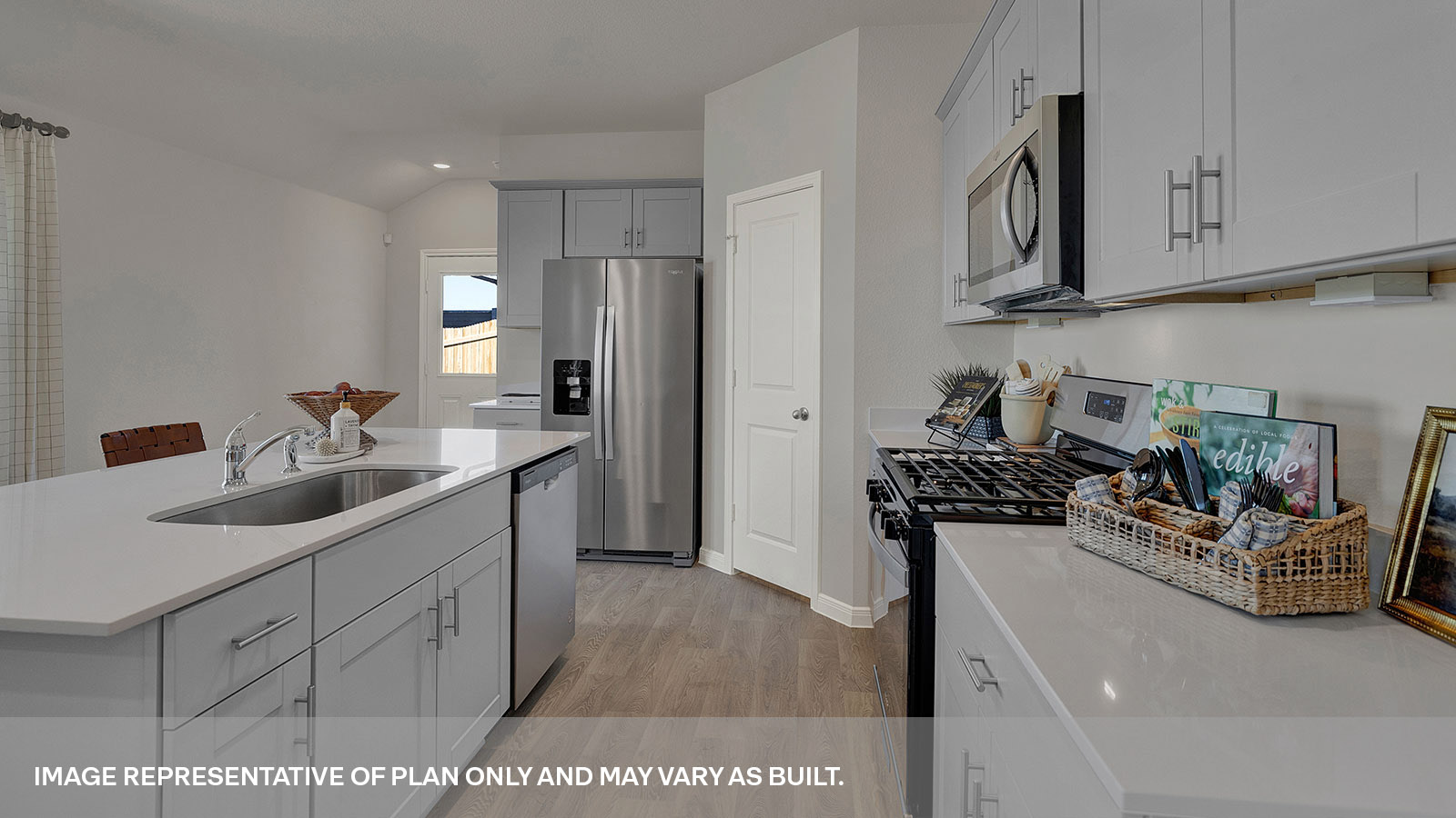 Kitchen with kitchen island and kitchen sink.