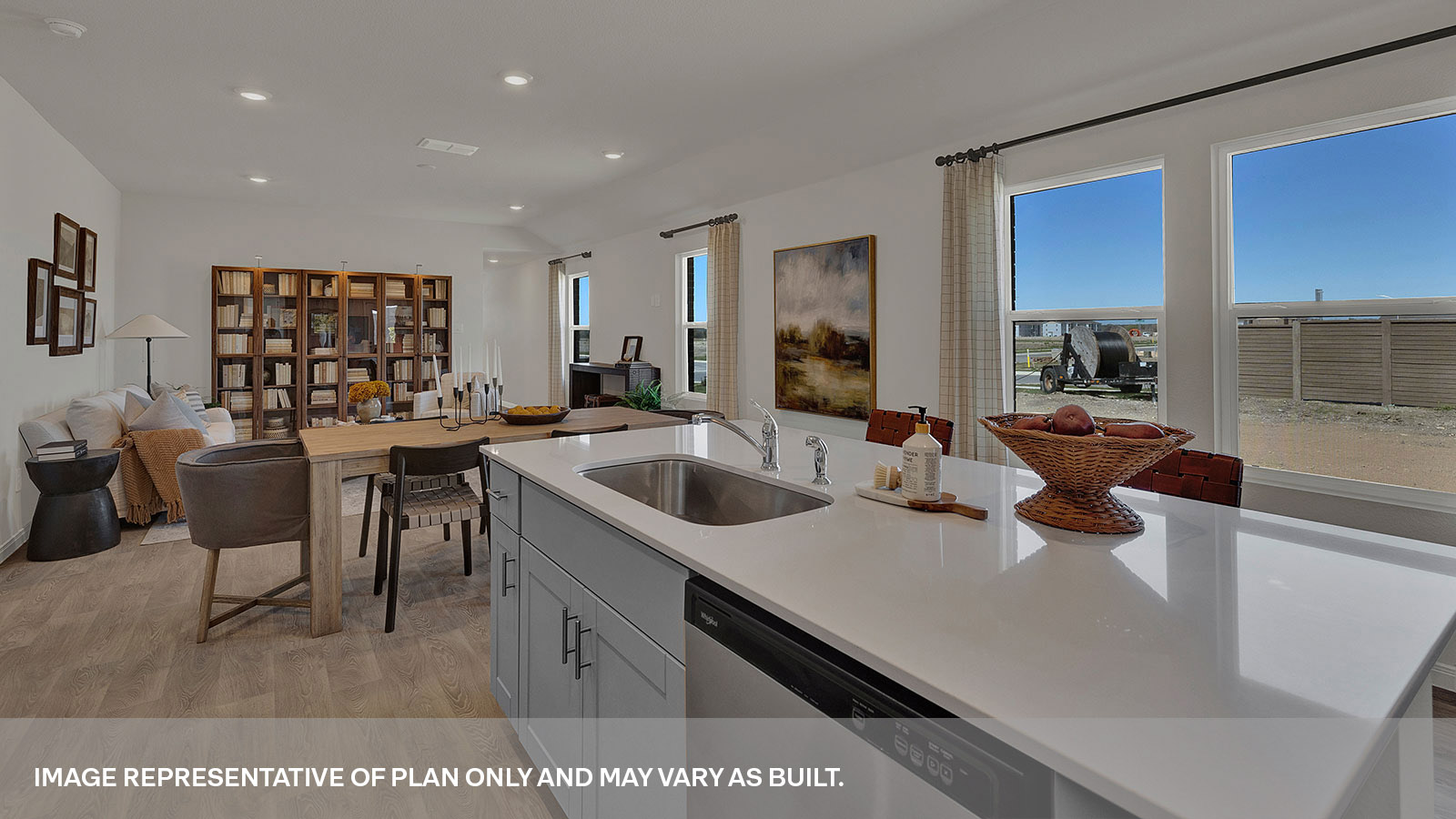 Kitchen with kitchen island and kitchen sink.