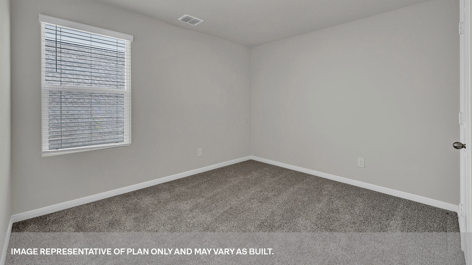 Third bedroom with carpeting and one window.