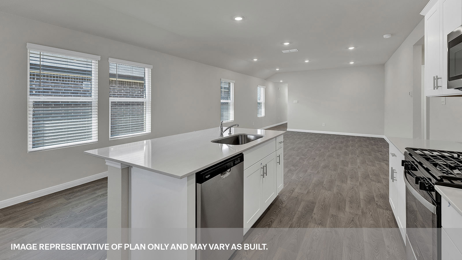 Kitchen with stainless steel appliances.