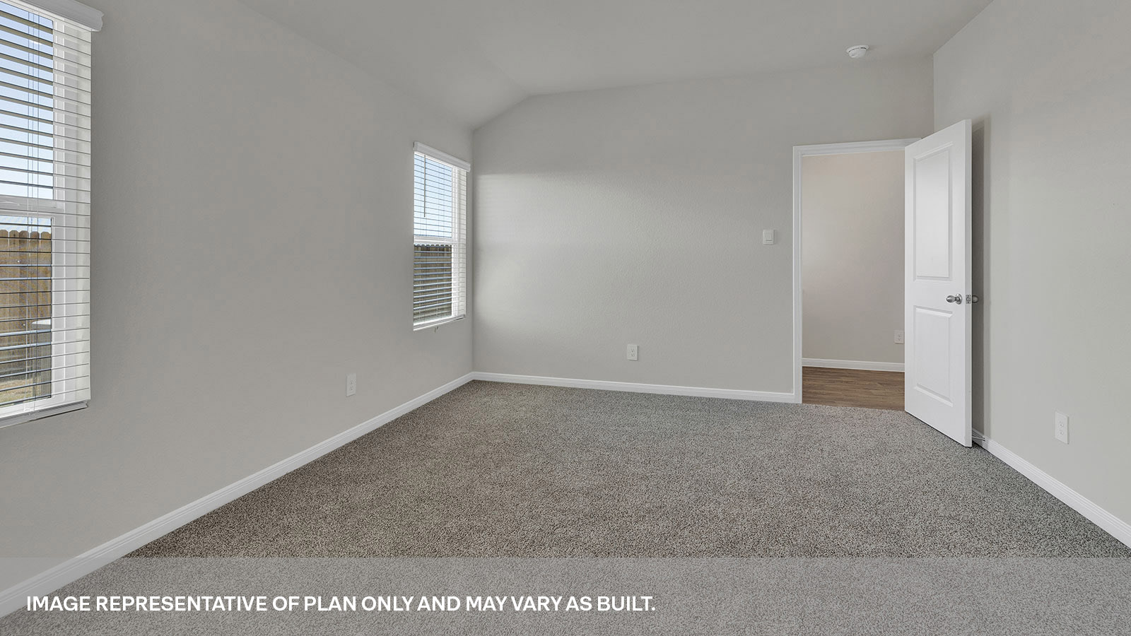 Main bedroom showing entry door to bedroom.