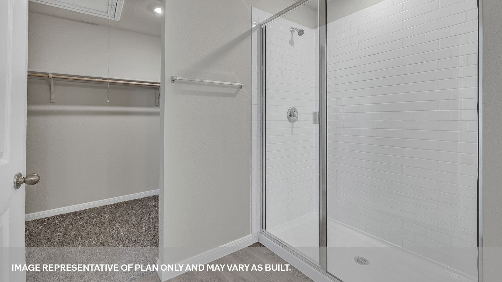 Main bathroom with walk-in shower and shower glass door.