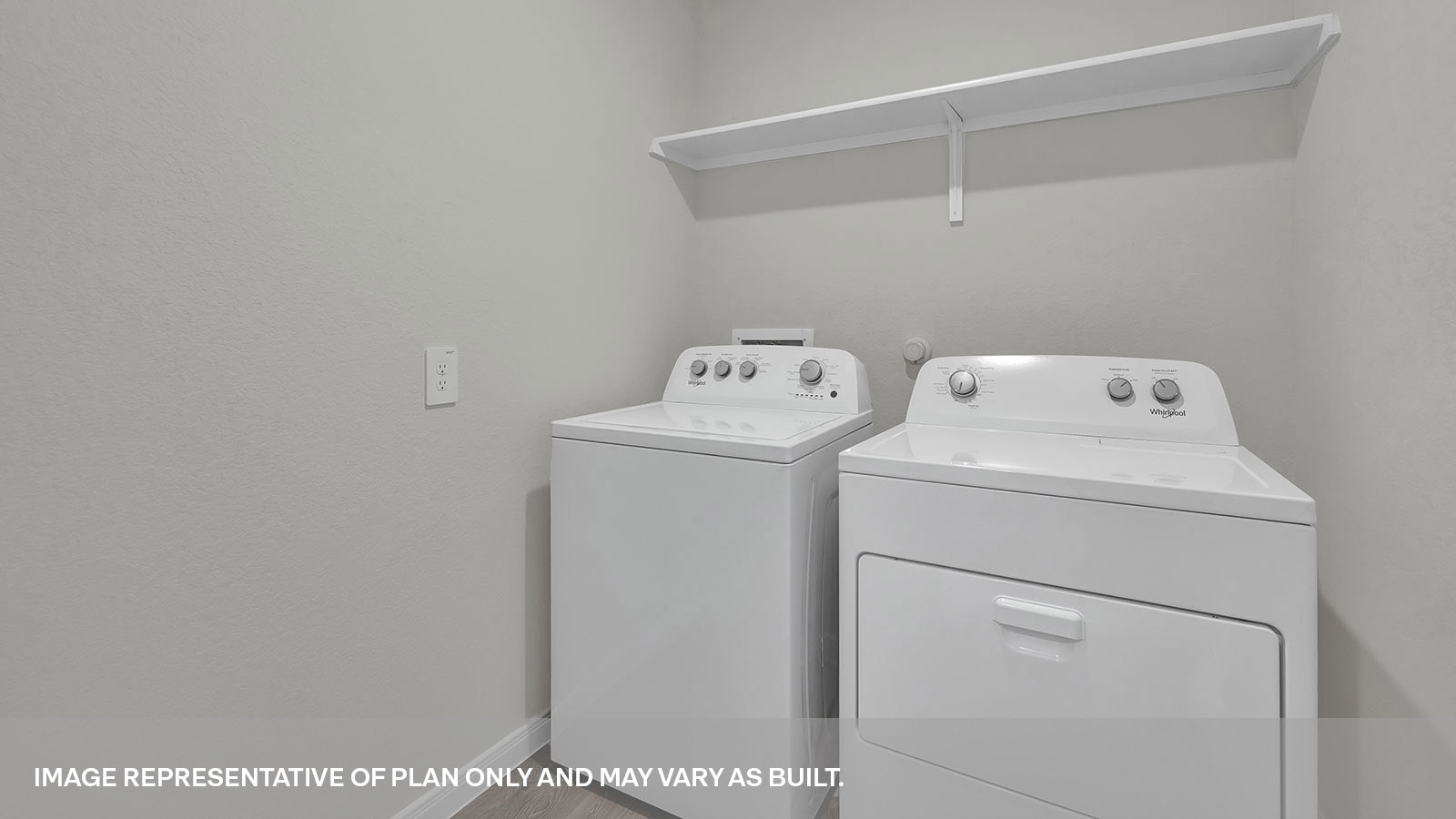 Laundry room with washer/dryer connections and wooden shelving.