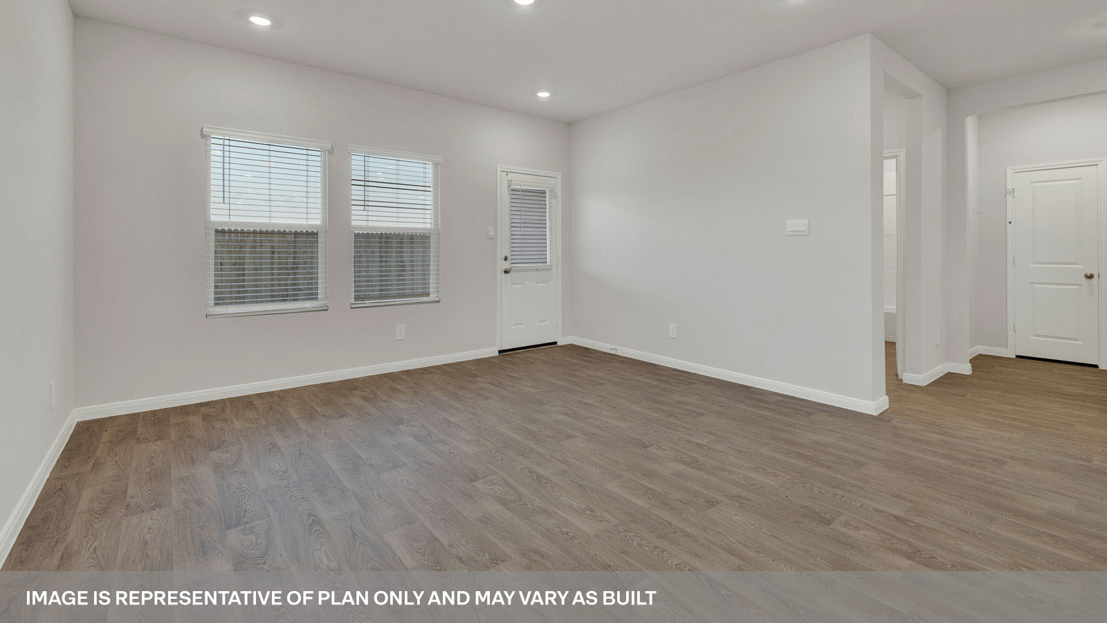 Open concept first floor with the living room, dining room and kitchen next to each other