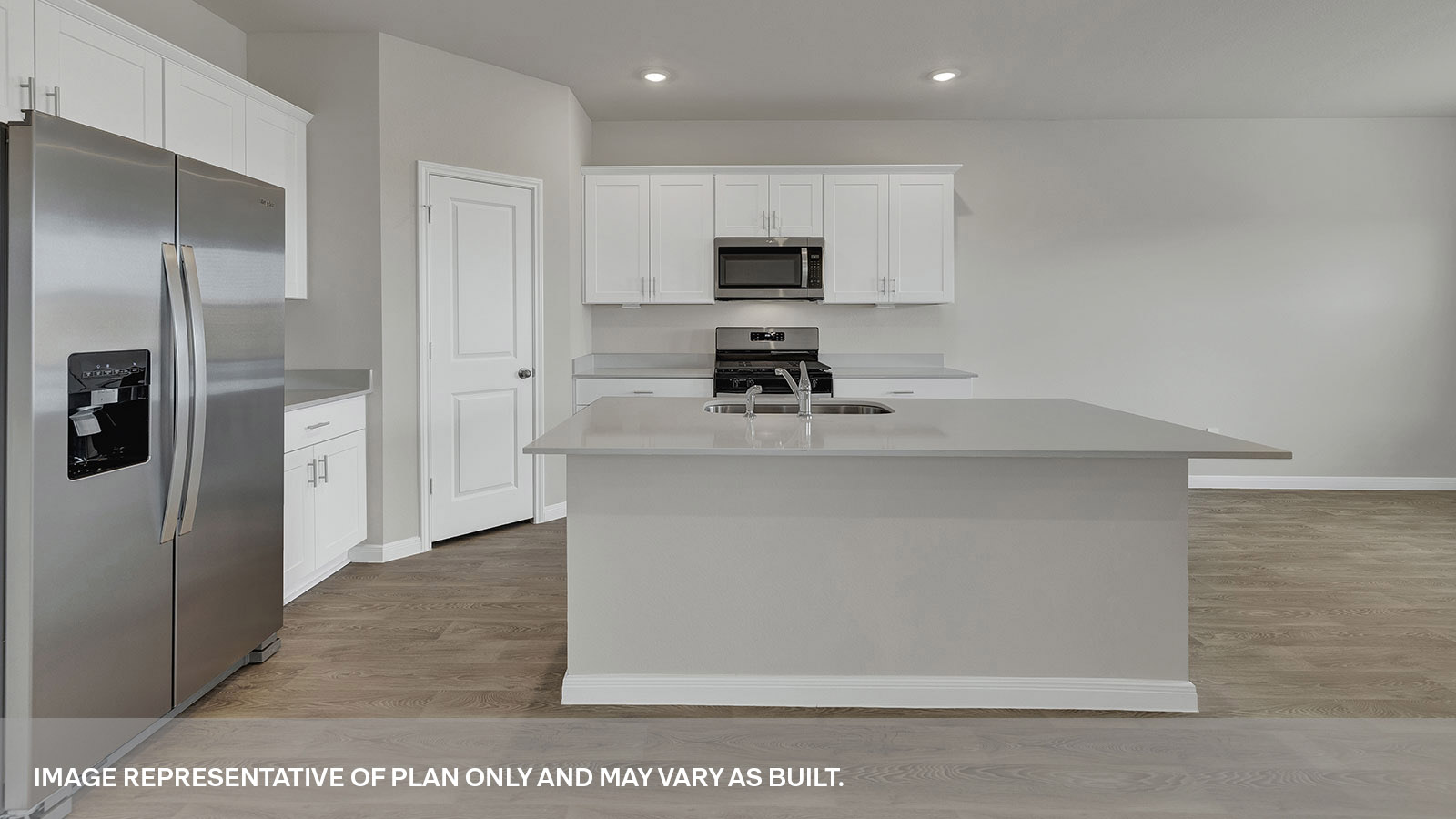 Kitchen with white cabinet and kitchen island.