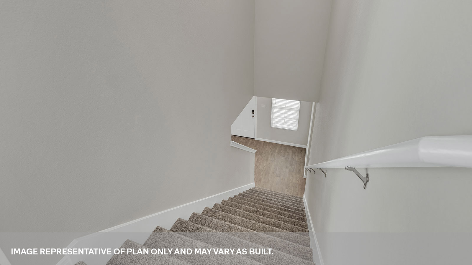 Stairs with carpeting leading to gameroom.