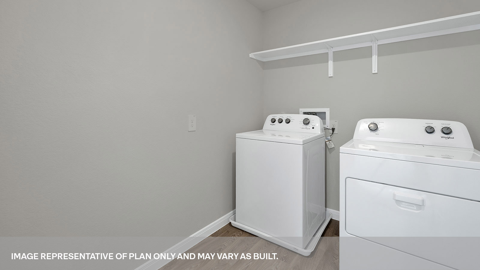 Laundry room with washer/dryer connections and wooden shelving.
