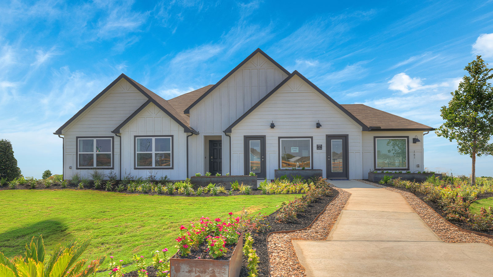 Farmhouse White Exterior with 3 car garage