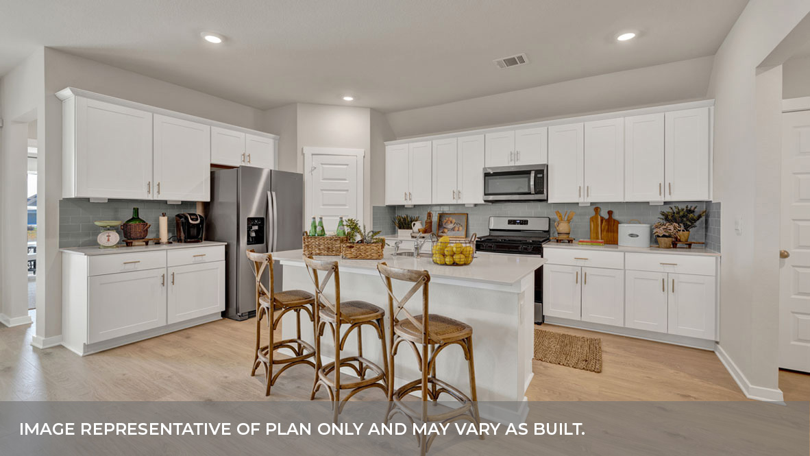 Kitchen with white cabinets.