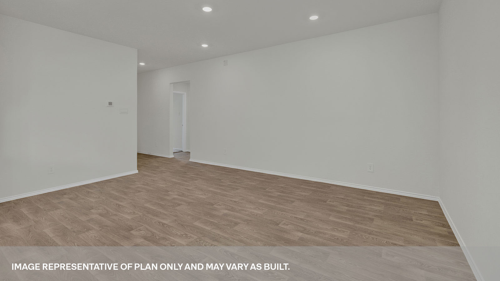 Living room leading to the front door and bedrooms.