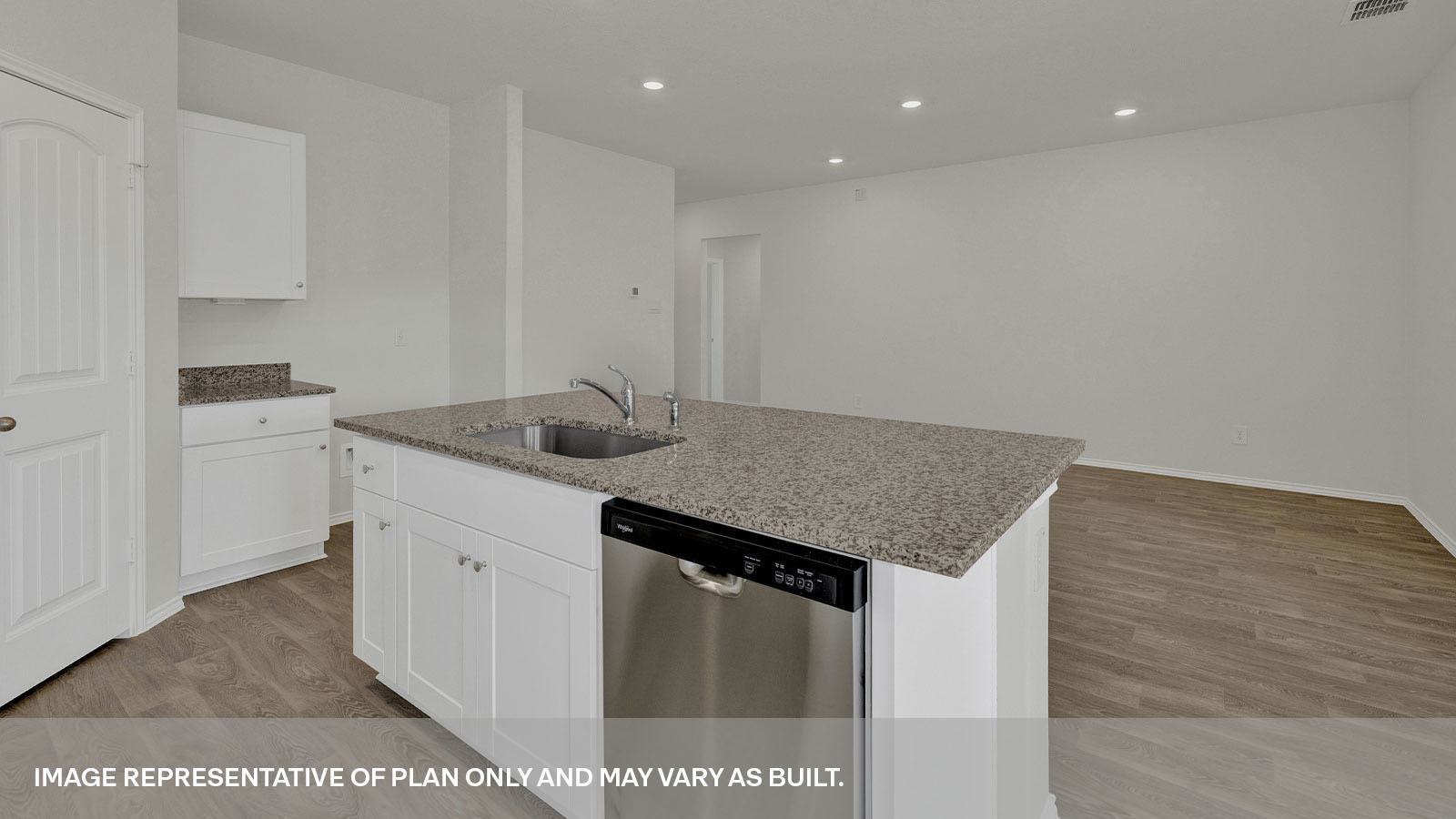 Kitchen island and large sink looking into the living room.