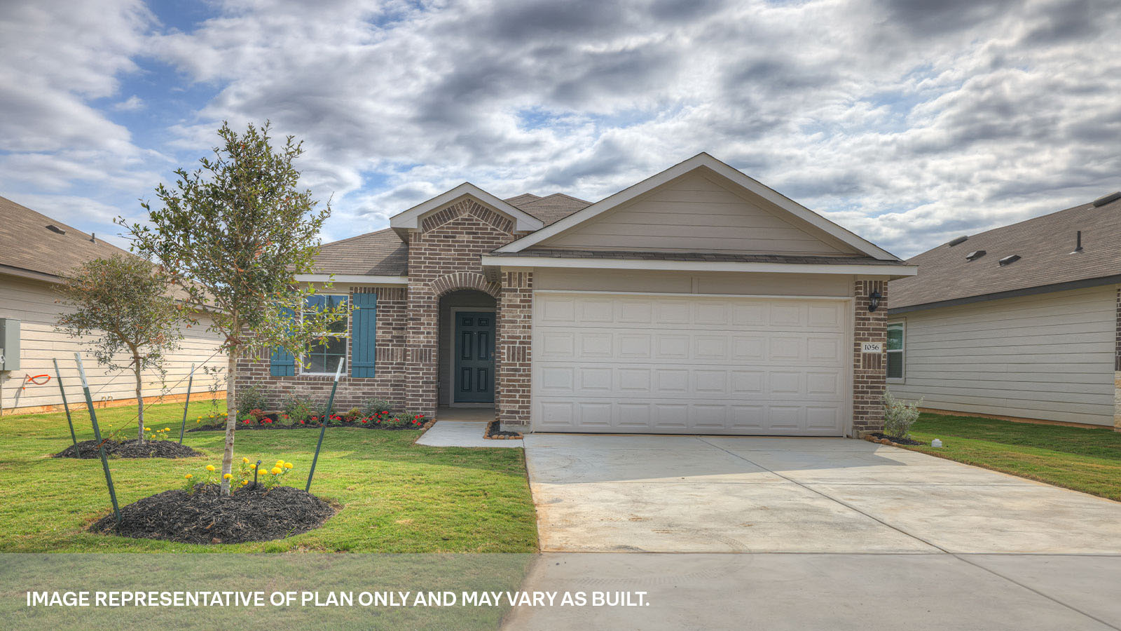 Single story home with stone and brick combo, one window in the front, and a 2 car garage.