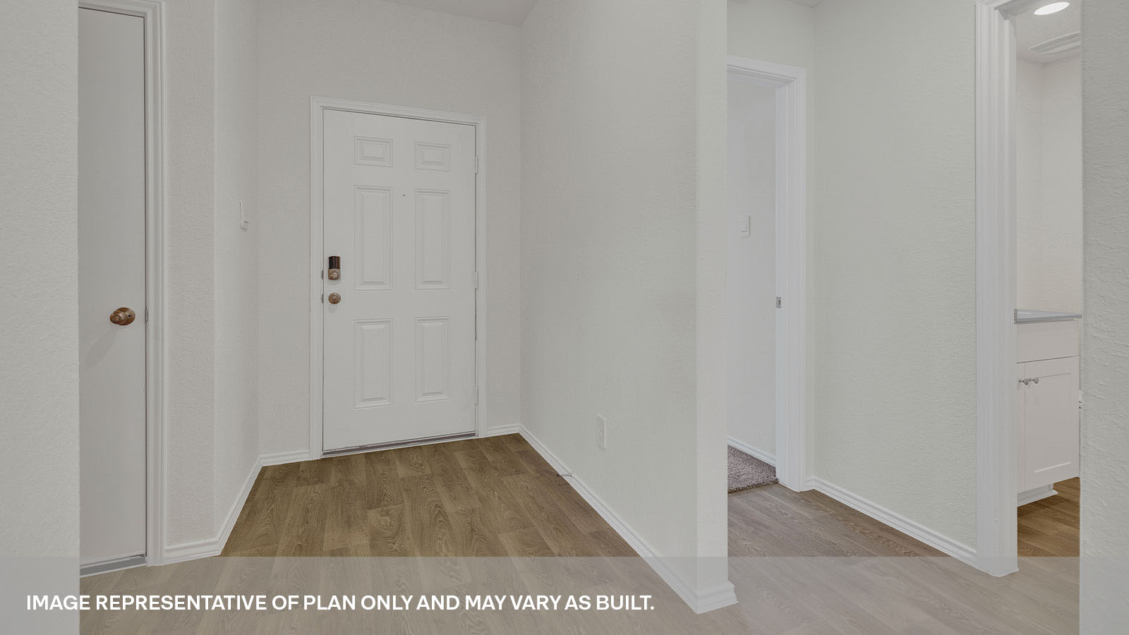 Entry hallway with front door.
