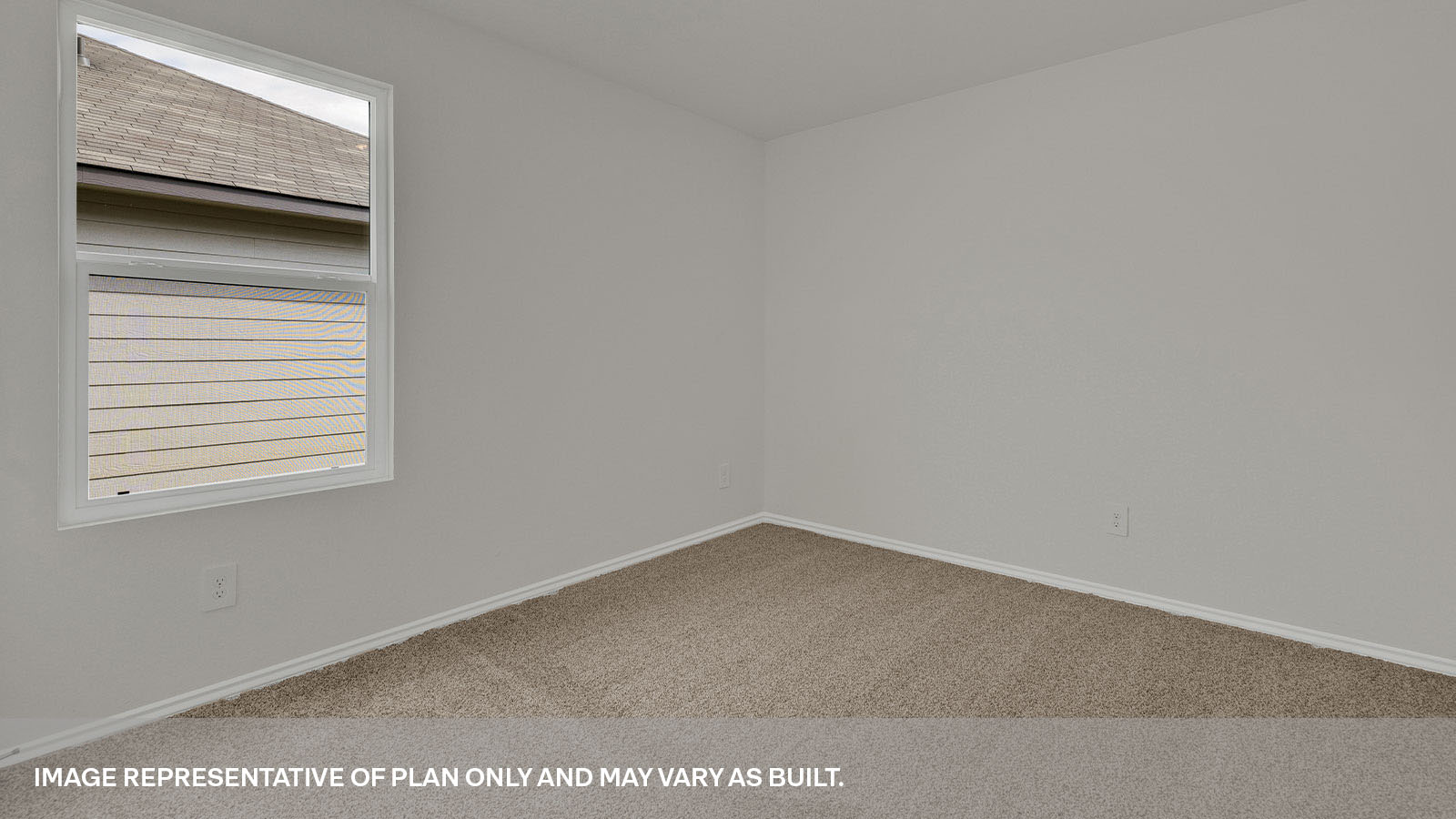 Second bedroom with carpeting and a window showing the front yard.