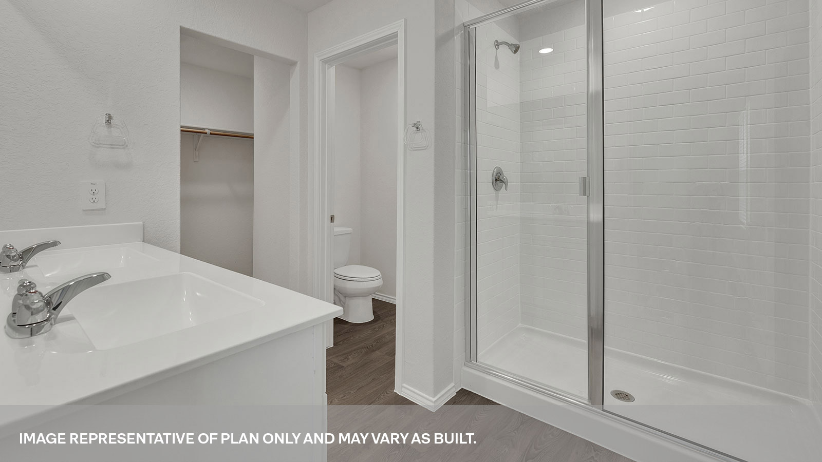 Main bathroom with a large walk-in shower and a single sink in a large vanity.