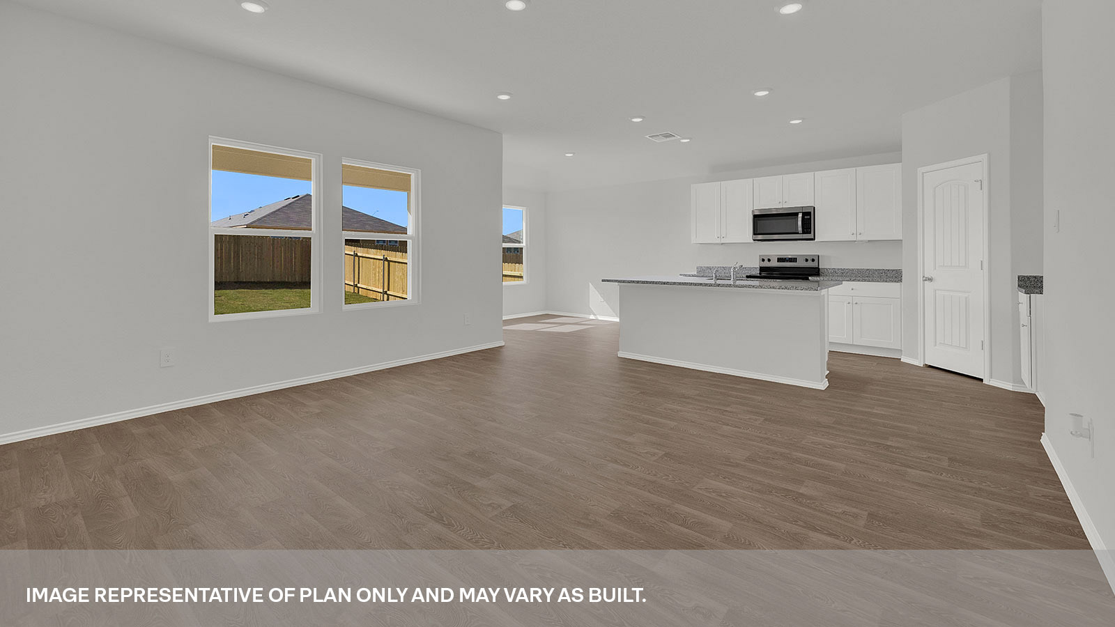 Living room looking over the kitchen.