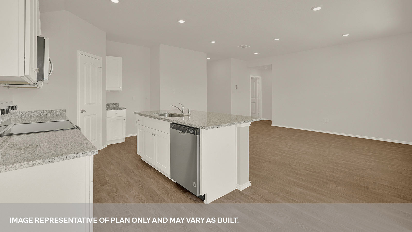 Kitchen with kitchen island looking over the living room.