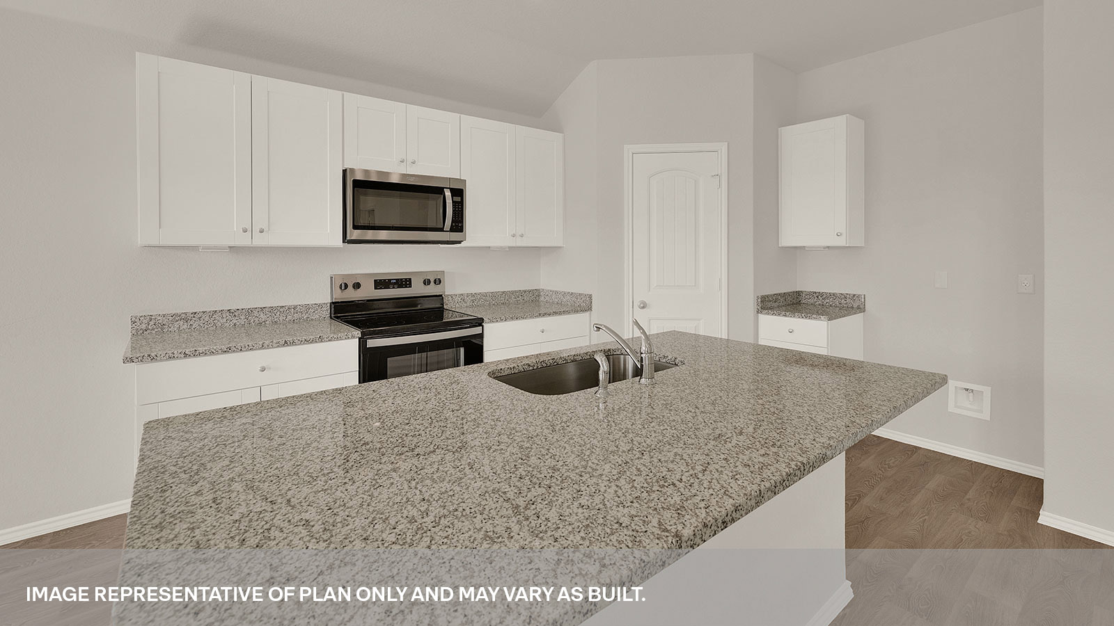 Kitchen with white cabinets, appliances, and granite countertops.