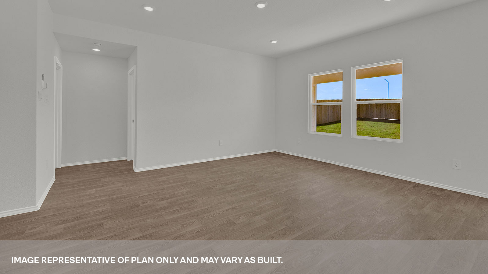 Living room leading to the main bedroom.