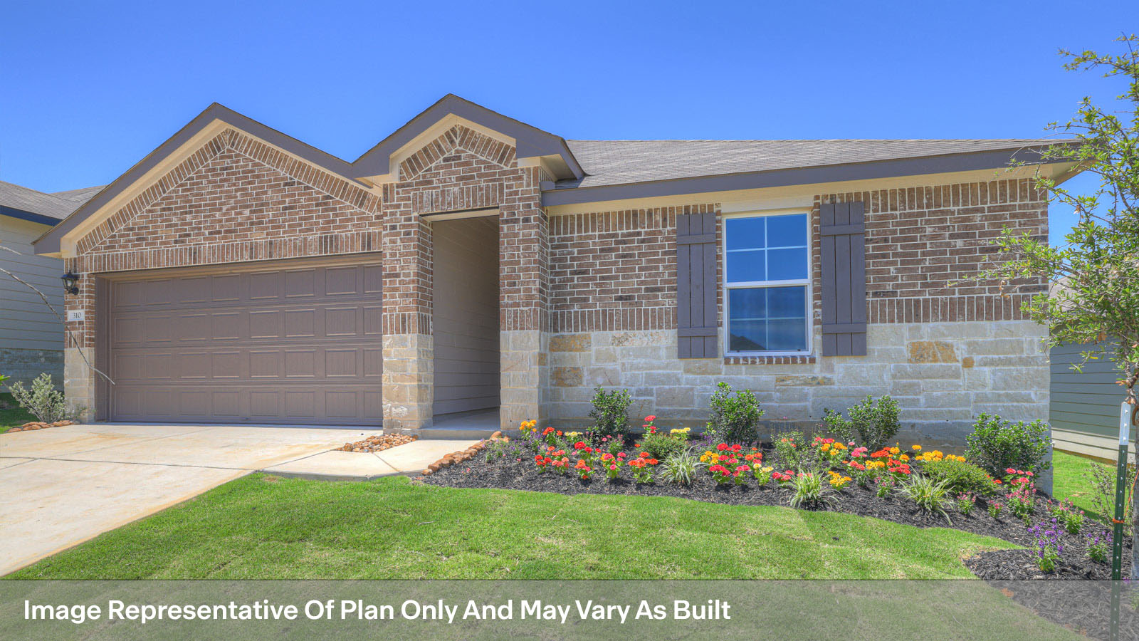 Single story home with stone and brick combo, one window in the front, and a 2 car garage.