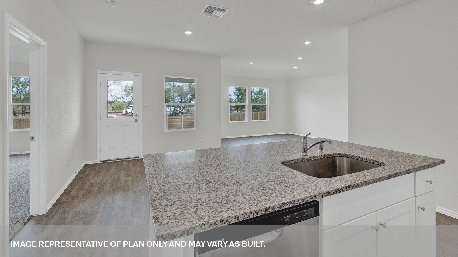 Kitchen island overlooking the dining room and living room.