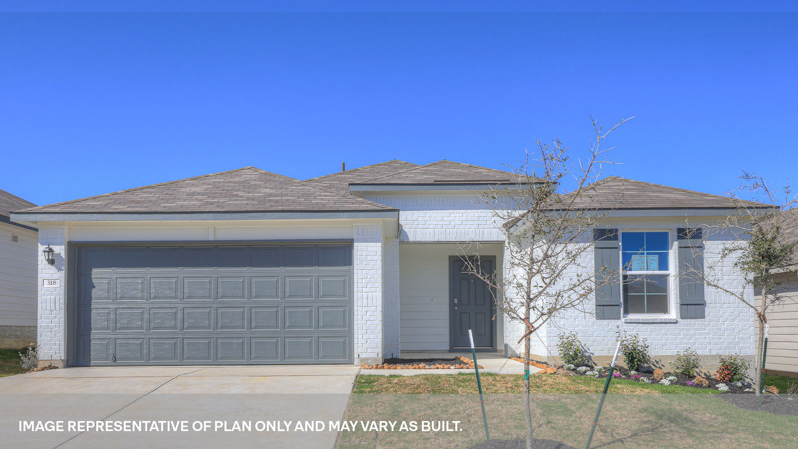 Single-story traditional brick exteriors with one window and a 2 car garage.