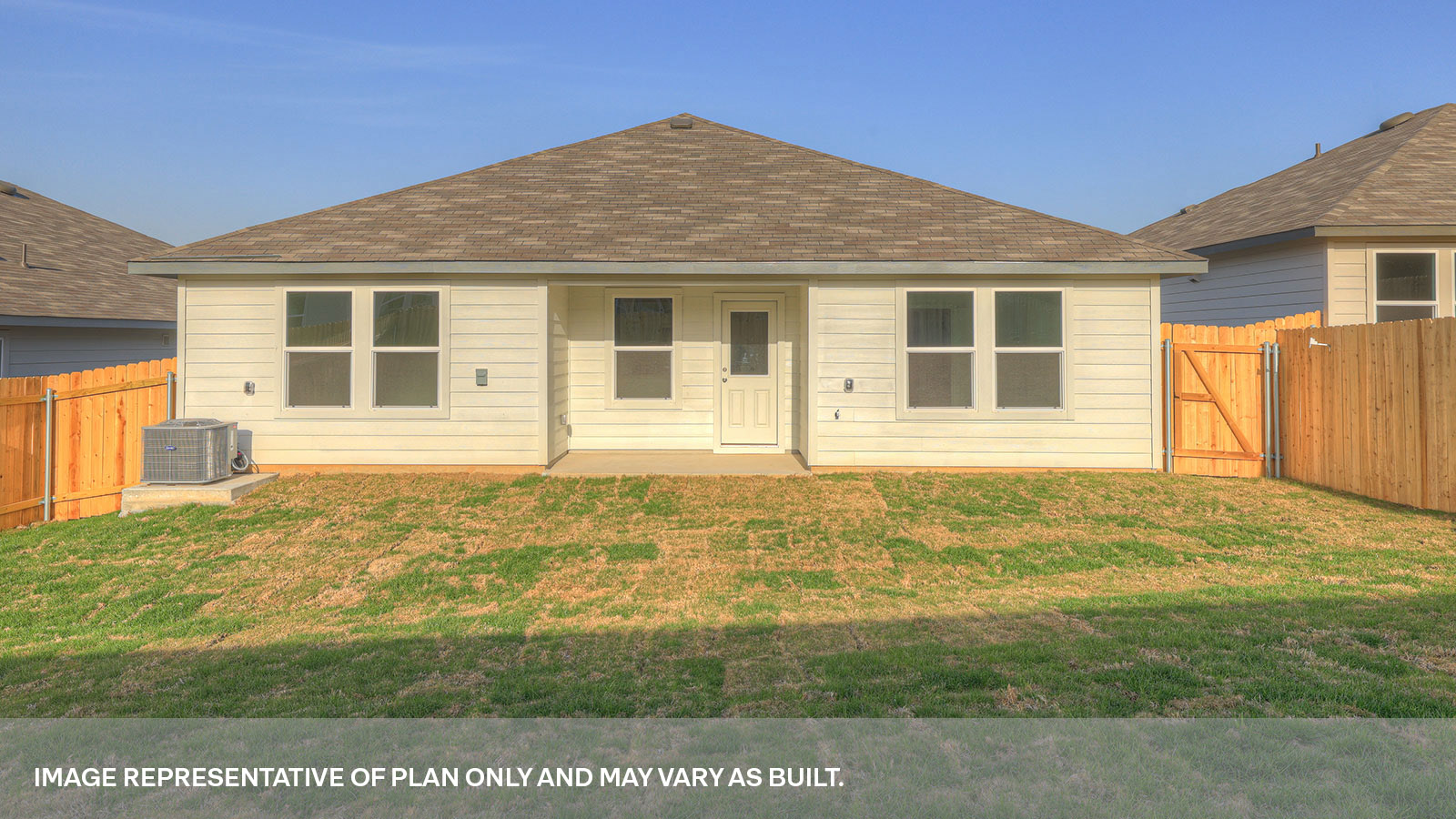 Covered patio and fully sodded backyard with privacy fence.