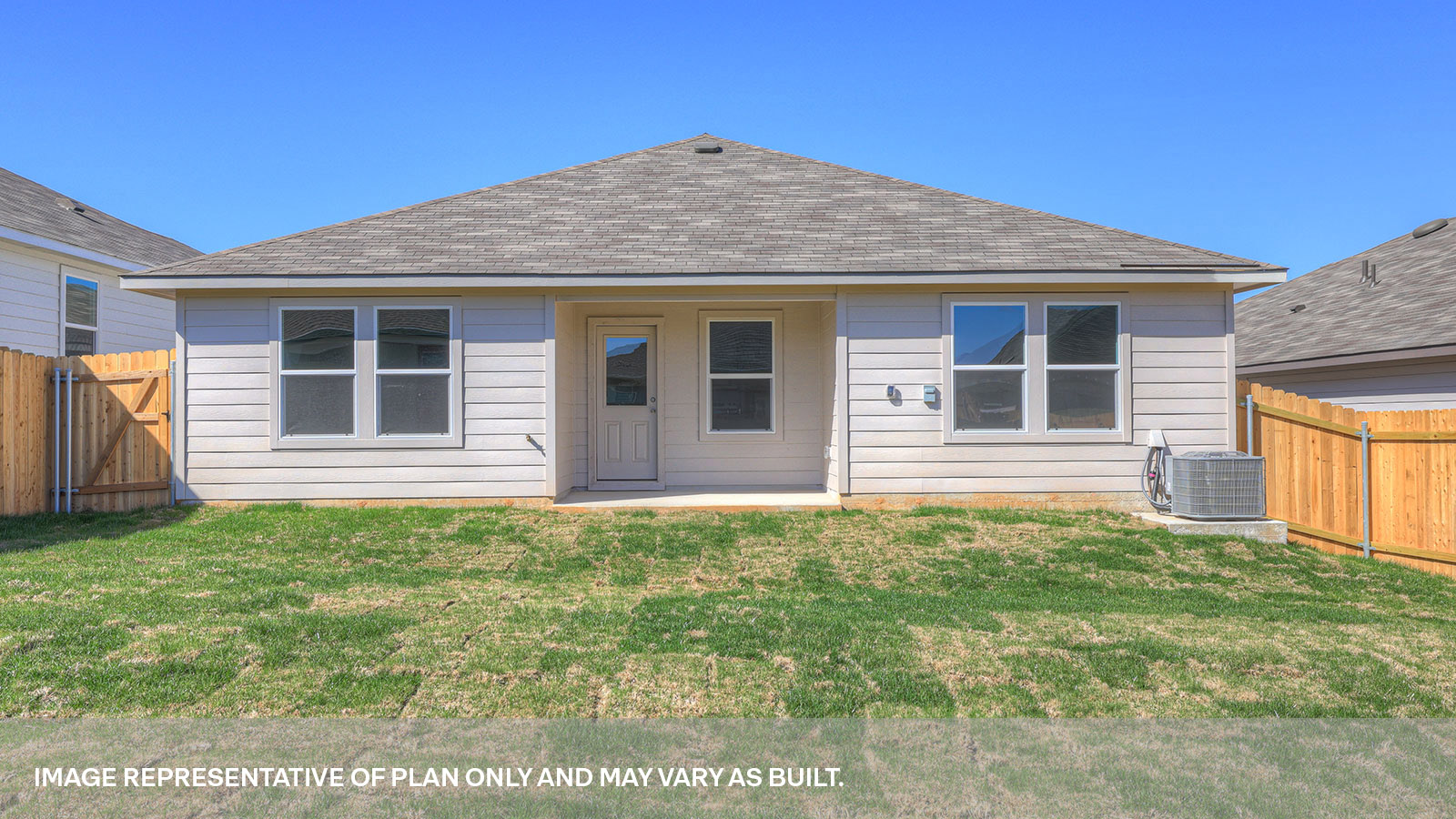 Covered patio with one window and a half lite exterior door.