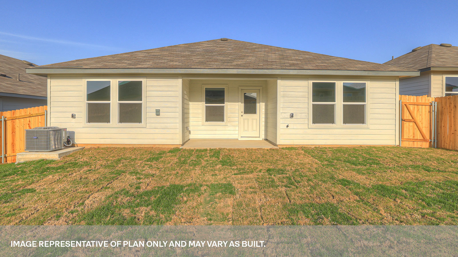 Covered patio and fully sodded backyard with privacy fence.