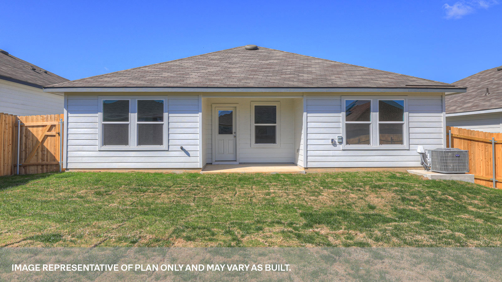 Covered patio and fully sodded backyard with privacy fence.