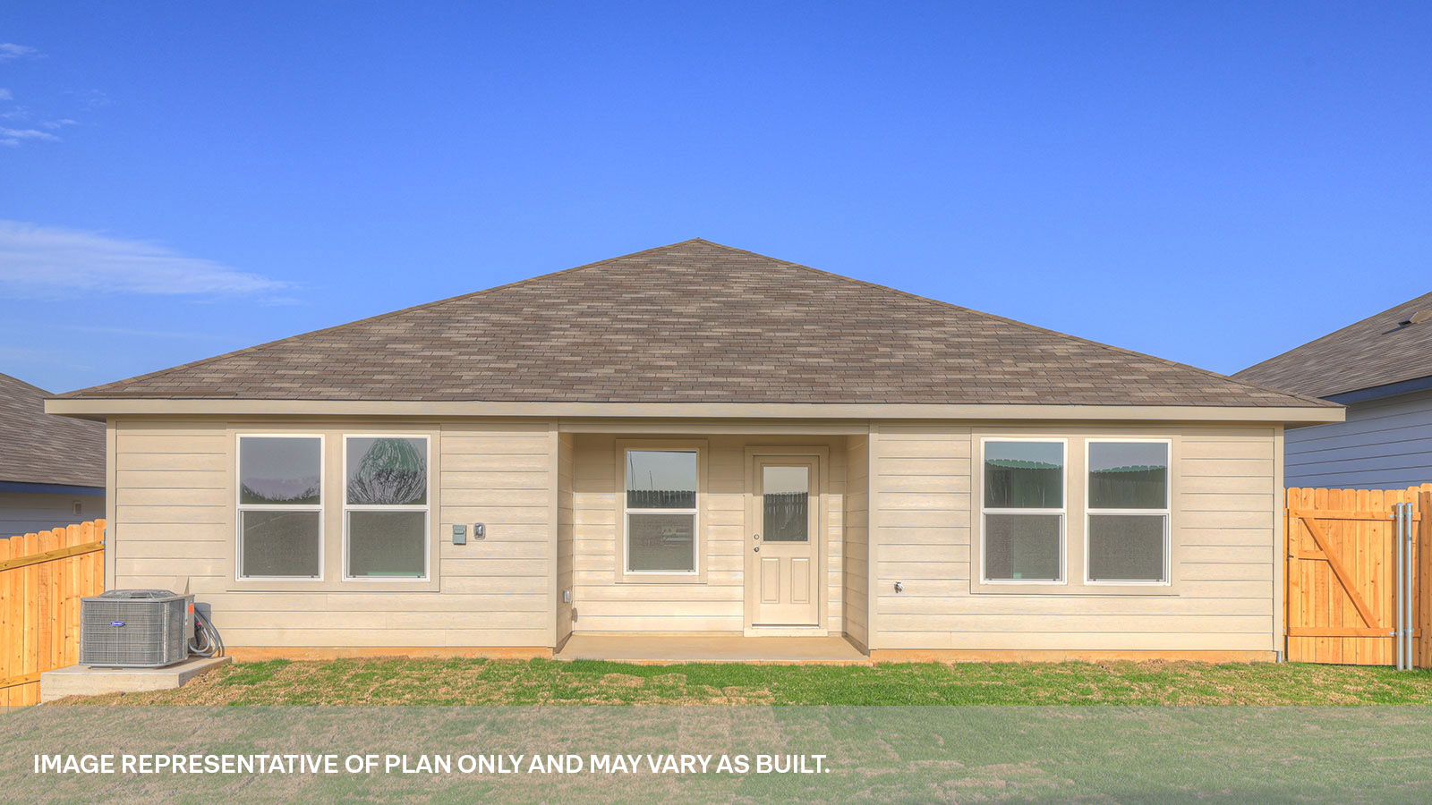 Covered patio with one window and a half lite exterior door.