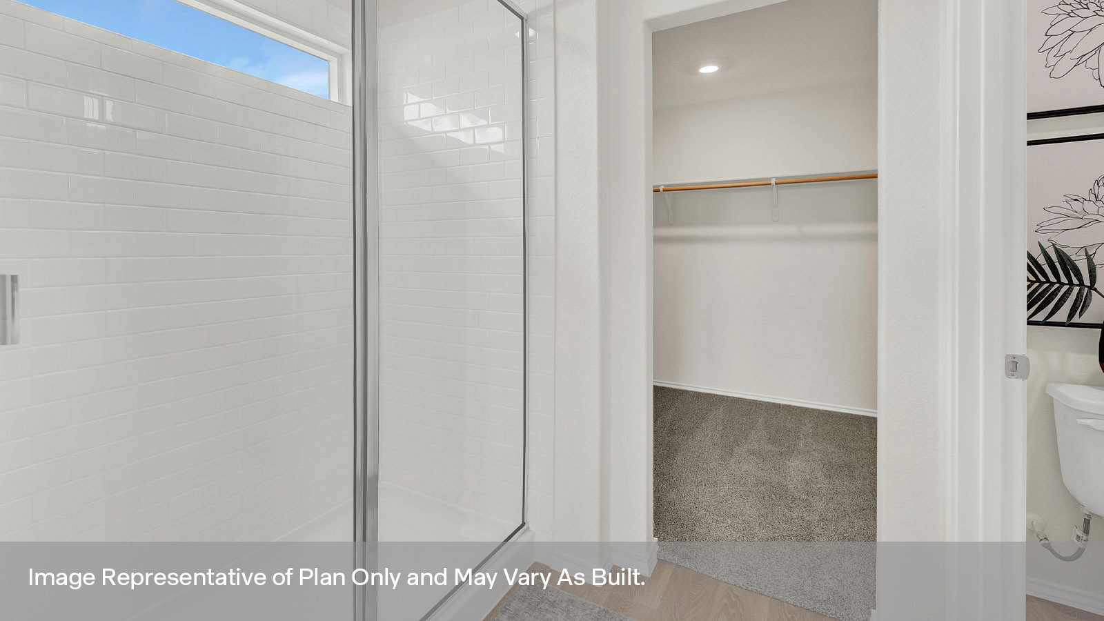 Main bathroom walk-in shower with glass door and wooden shelving.