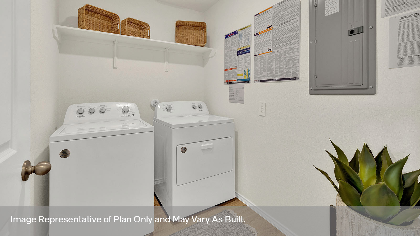 Laundry room with washer/dryer connections and wooden shelving.