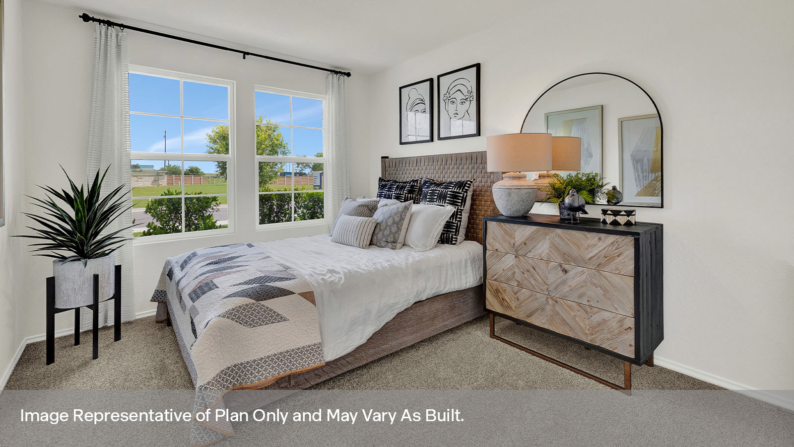 Front bedroom with carpeting and one window.