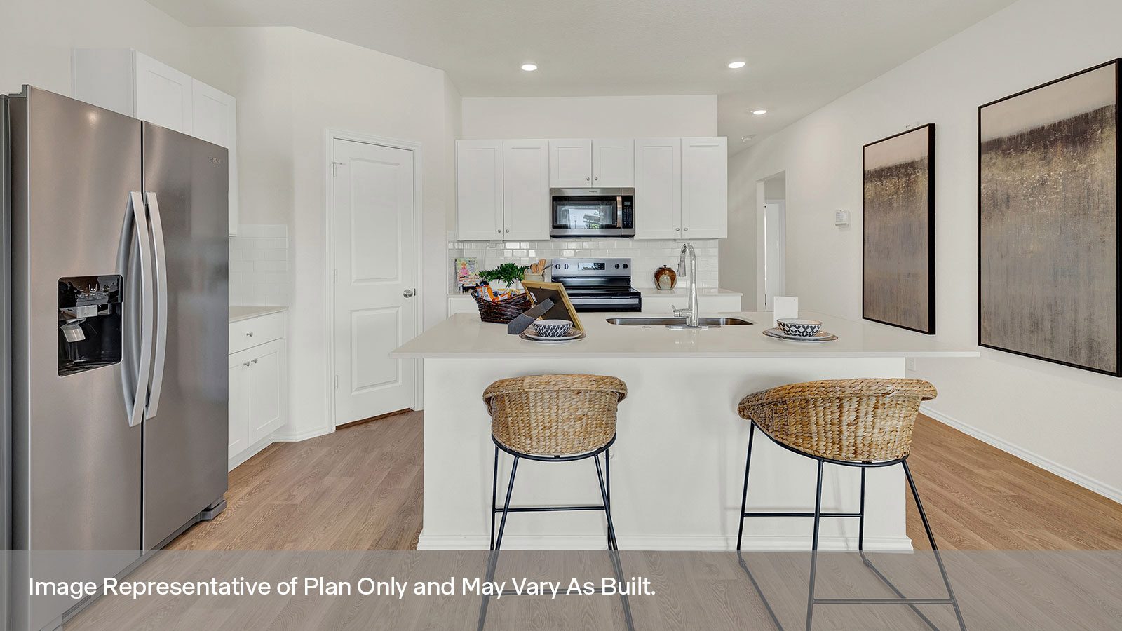 Kitchen with kitchen island and sink.
