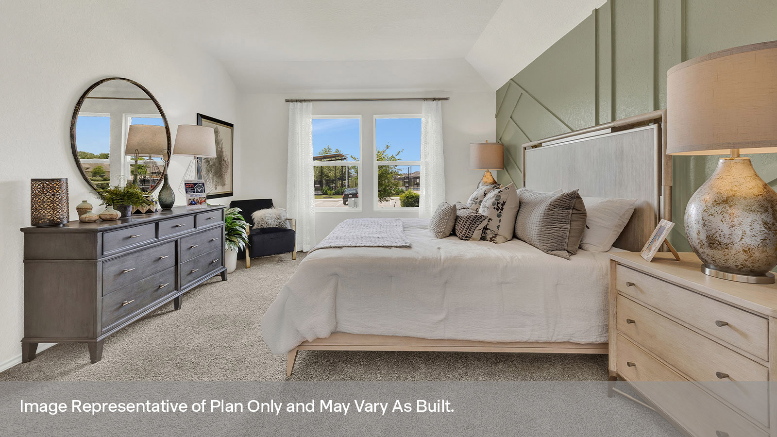 Main bedroom with carpeting and two windows.