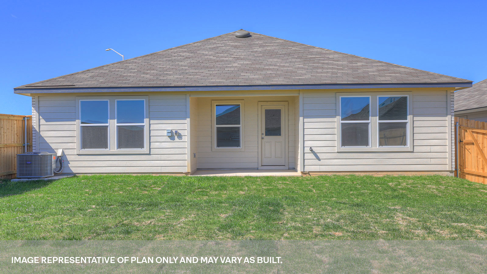 Covered patio with one window and a half lite exterior door.