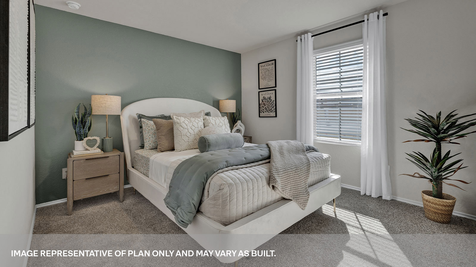 Second bedroom with carpeting, a window showing the side yard and closet door.