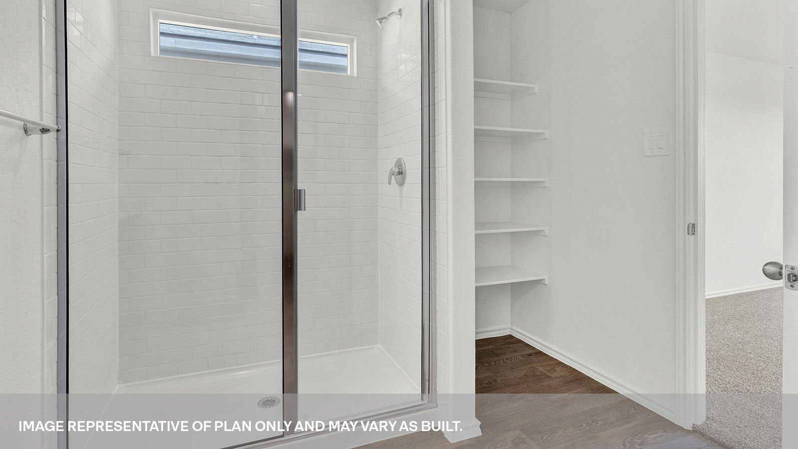 Main bathroom with a large walk-in shower and shelves.