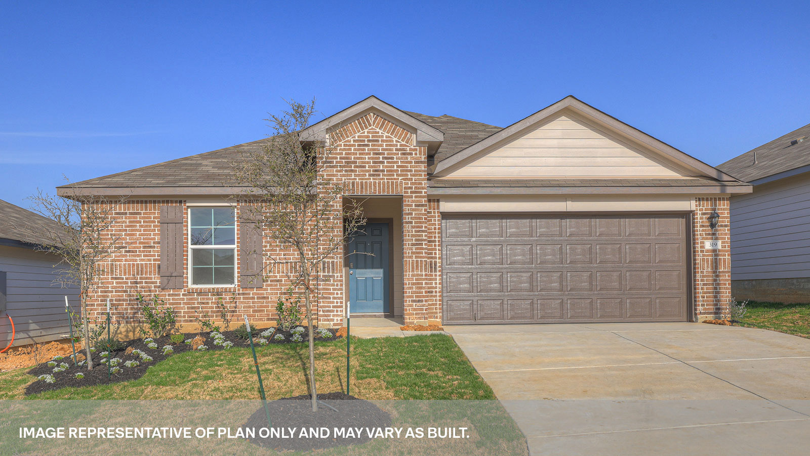 Single-story masonry exterior home with a 2 car garage.