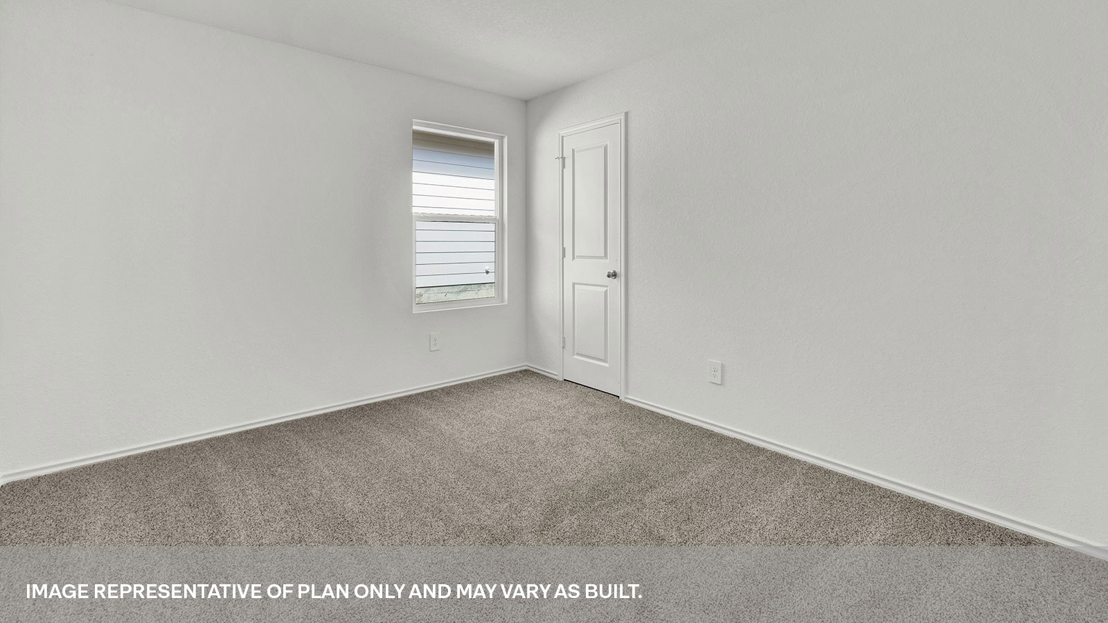 Second bedroom with carpeting and a window showing the side yard.