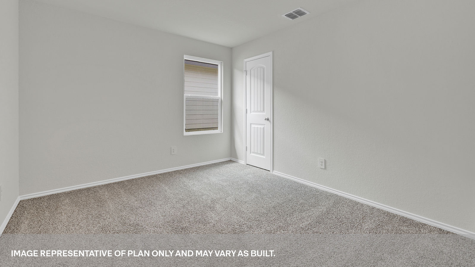 Second bedroom with carpeting and a window showing the side yard.