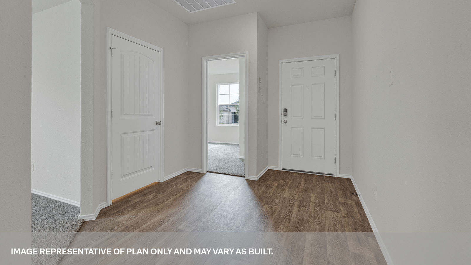 Front bedroom, Closet and Entry hallway with front door.