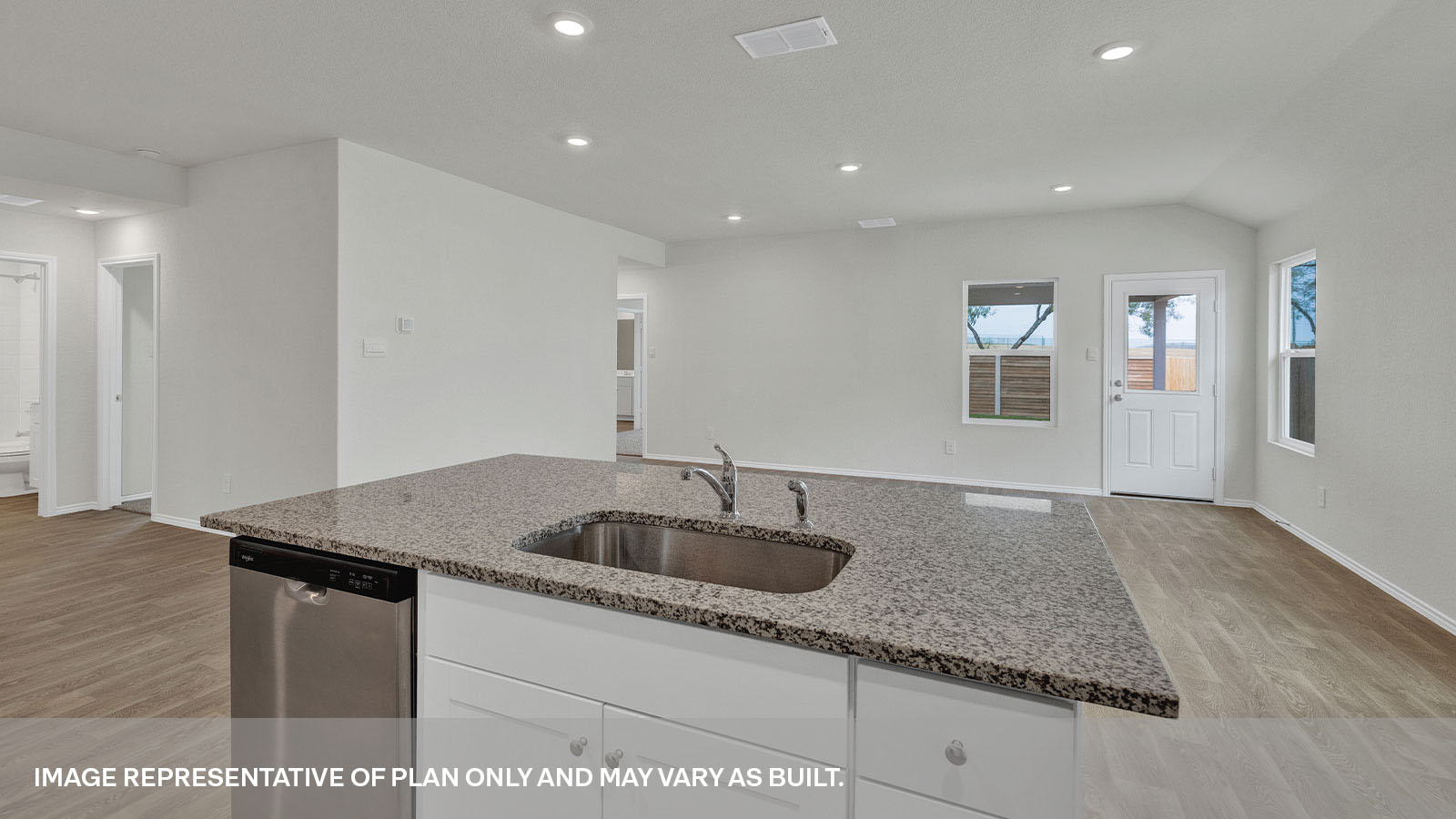 Kitchen island and large sink looking into the living room.