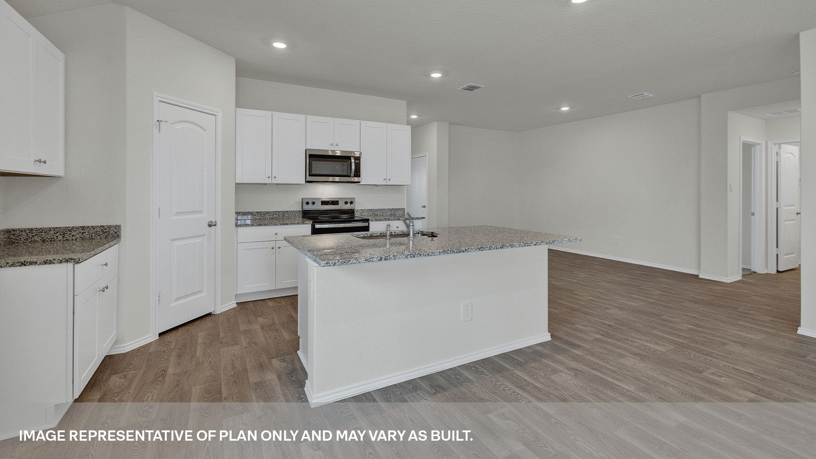 Kitchen island and large sink looking into the living room.