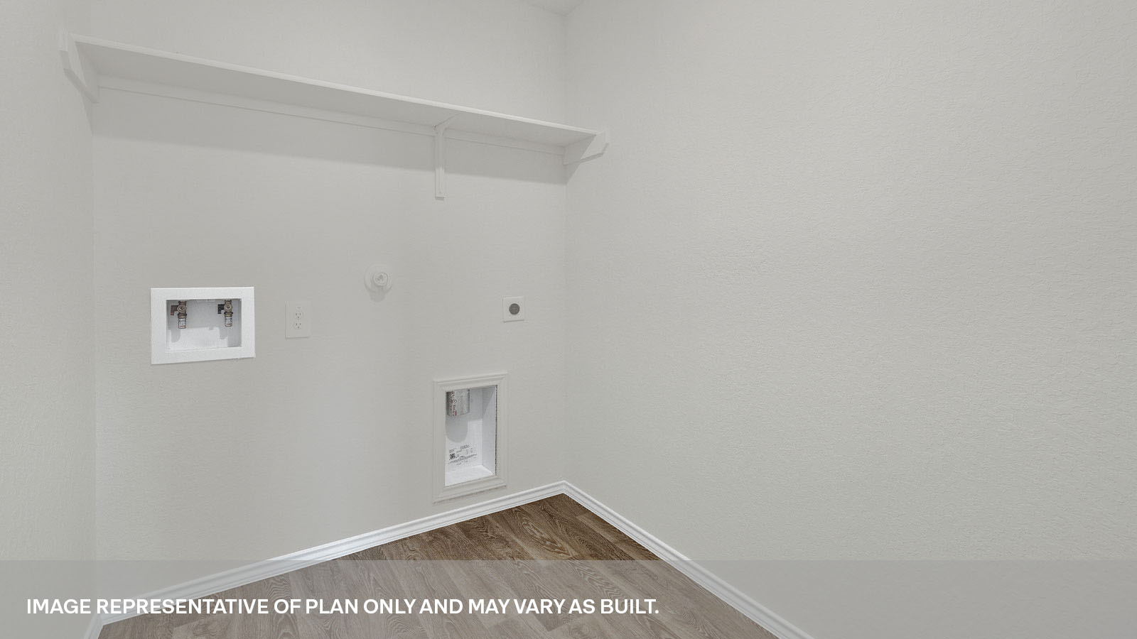 Laundry room with a wood shelf and washer/dryer connections.